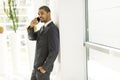 Handsome young black man with mobile phone Royalty Free Stock Photo