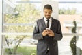 Handsome young black man with mobile phone Royalty Free Stock Photo