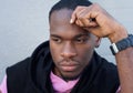 Handsome young black man thinking Royalty Free Stock Photo