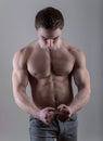 Handsome young bodybuilder posing Royalty Free Stock Photo