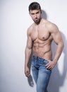 Handsome young bodybuilder with toned body Royalty Free Stock Photo