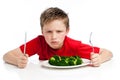 Handsome Young Boy Eating Broccoli Royalty Free Stock Photo