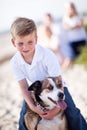 Handsome Young Boy Playing With His Dog