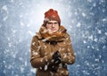 Handsome boy shivering at snowstorm concept Royalty Free Stock Photo