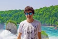 young boy in rhine falls, Switzerland Royalty Free Stock Photo