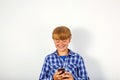 Handsome young boy speaking with a mobile phone Royalty Free Stock Photo