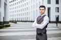 A handsome young business man at office building Royalty Free Stock Photo