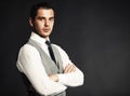 Handsome young business man standing on black Royalty Free Stock Photo