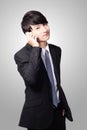 Handsome young business man using cell phone Royalty Free Stock Photo