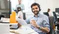 Handsome young business man working with documents in office Royalty Free Stock Photo