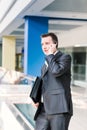 Handsome young businessman talking on his mobile Royalty Free Stock Photo