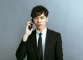 Handsome young businessman talking on mobile phone Royalty Free Stock Photo