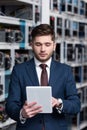 handsome young businessman using tablet at ethereum Royalty Free Stock Photo