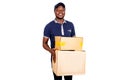 Handsome young delivery man holding a cardboard Royalty Free Stock Photo
