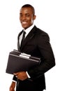 Handsome young executive holding files