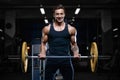 Handsome model young man workout in gym Royalty Free Stock Photo