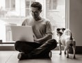 Handsome young freelancer man using laptop computer