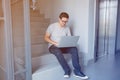 Handsome young freelancer man using laptop computer Royalty Free Stock Photo