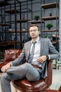 Handsome young business man in office Royalty Free Stock Photo