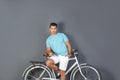 Handsome young hipster man with bicycl Royalty Free Stock Photo