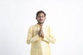 Handsome Young Indian Man Showing Namaste or welcome gesture, Isolated on White Background Royalty Free Stock Photo