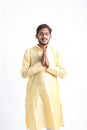 Handsome Young Indian Man Showing Namaste or welcome gesture, Isolated on White Background Royalty Free Stock Photo