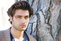 Handsome young italian man portrait, stylish hair. Male hairstyle