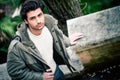 Handsome young italian man, stylish hair and coat outdoors Royalty Free Stock Photo