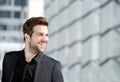 Handsome young man with beard smiling Royalty Free Stock Photo