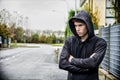 Handsome young man in black hoodie sweater