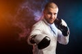 Man in suit boxing Royalty Free Stock Photo