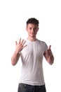 Handsome young man counting to six 6 with fingers Royalty Free Stock Photo