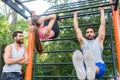 Handsome young man doing leg raises during six-packs abs workout Royalty Free Stock Photo