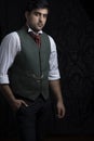 Victorian gentleman posing in a room resembling a study Royalty Free Stock Photo