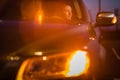 Handsome young man driving his car at night Royalty Free Stock Photo