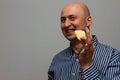 A handsome young man eating chips Royalty Free Stock Photo