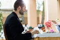 Handsome young man eating salad in the restaurant. Royalty Free Stock Photo