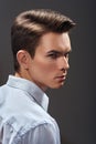 Handsome young man with fashion haircut