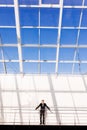 Handsome young man in full suit while standing modern Royalty Free Stock Photo