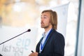 Handsome young man giving a speech Royalty Free Stock Photo