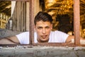 Handsome young man with happy expression in rusty Royalty Free Stock Photo