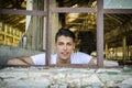 Handsome young man with happy expression in rusty Royalty Free Stock Photo