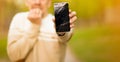 Young man hold broken smartphone screen stressed with hand on head, shocked with shame and surprise face, angry and frust