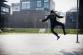 Handsome young man jumping for joy Royalty Free Stock Photo