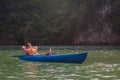 Happy man in a kayak boat on the lake. Relaxing in nature Royalty Free Stock Photo