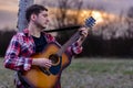 Man playing classical acoustic guitar Royalty Free Stock Photo