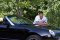 Handsome Young man leaning on Car Royalty Free Stock Photo