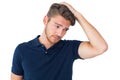 Handsome young man looking confused Royalty Free Stock Photo