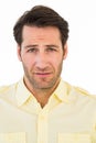 Handsome young man looking confused Royalty Free Stock Photo