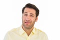 Handsome young man looking confused Royalty Free Stock Photo
